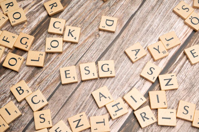 https://www.pexels.com/photo/scrabble-tiles-on-a-wooden-table-with-the-word-rock-19891034/